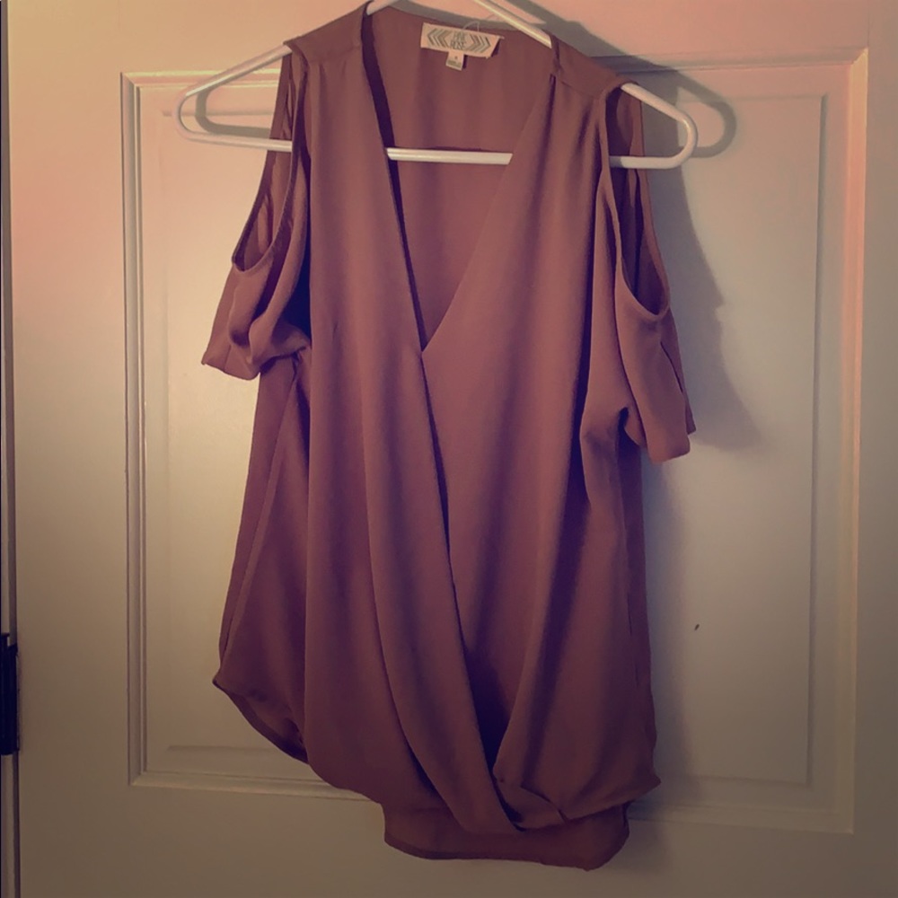 Open shoulder shirt. Super cute and dressy